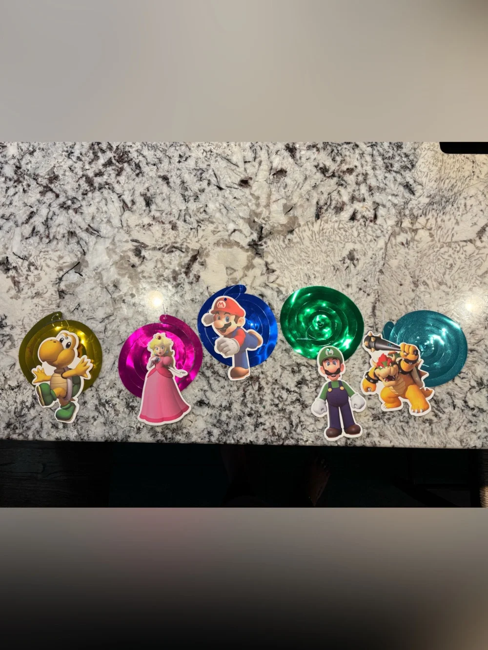 Assorted Super Mario Galaxy birthday decorations
